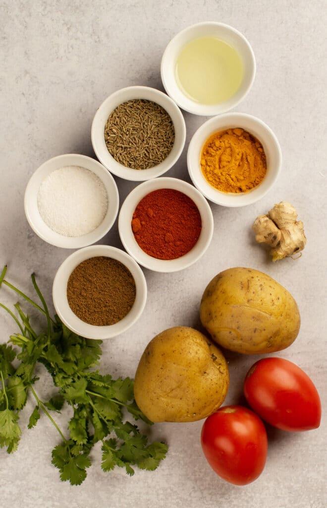 Ingredients for Aloo Tamatar ki sabji