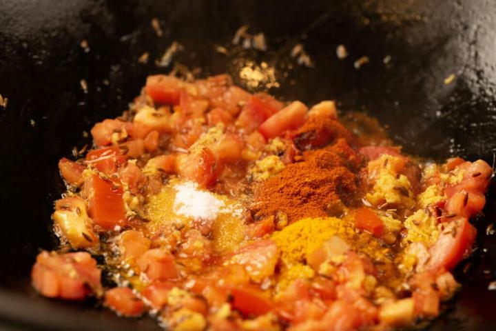 Cook Tomatoes and Spices.