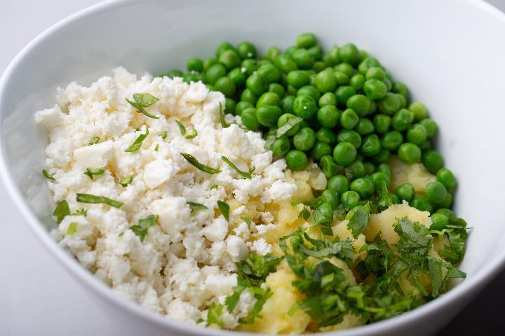 Add peas, paneer & cilantro